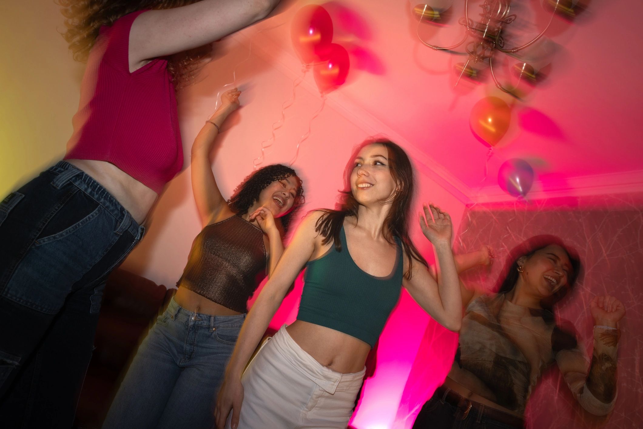 Friends dancing together at a party