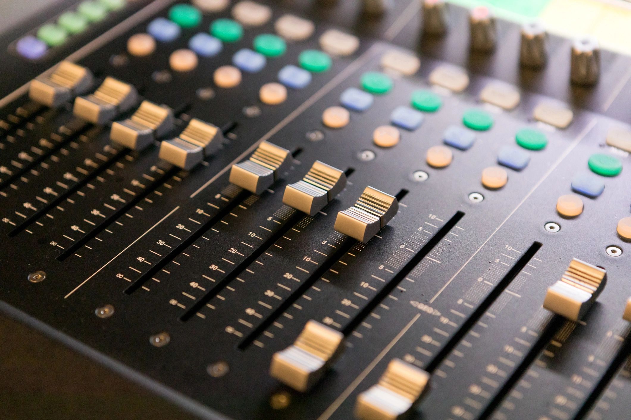 Close-up of an audio mixing console